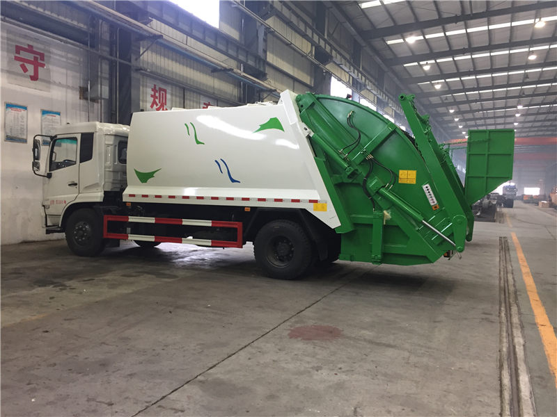 東風天錦壓縮垃圾車（14方帶擺臂）